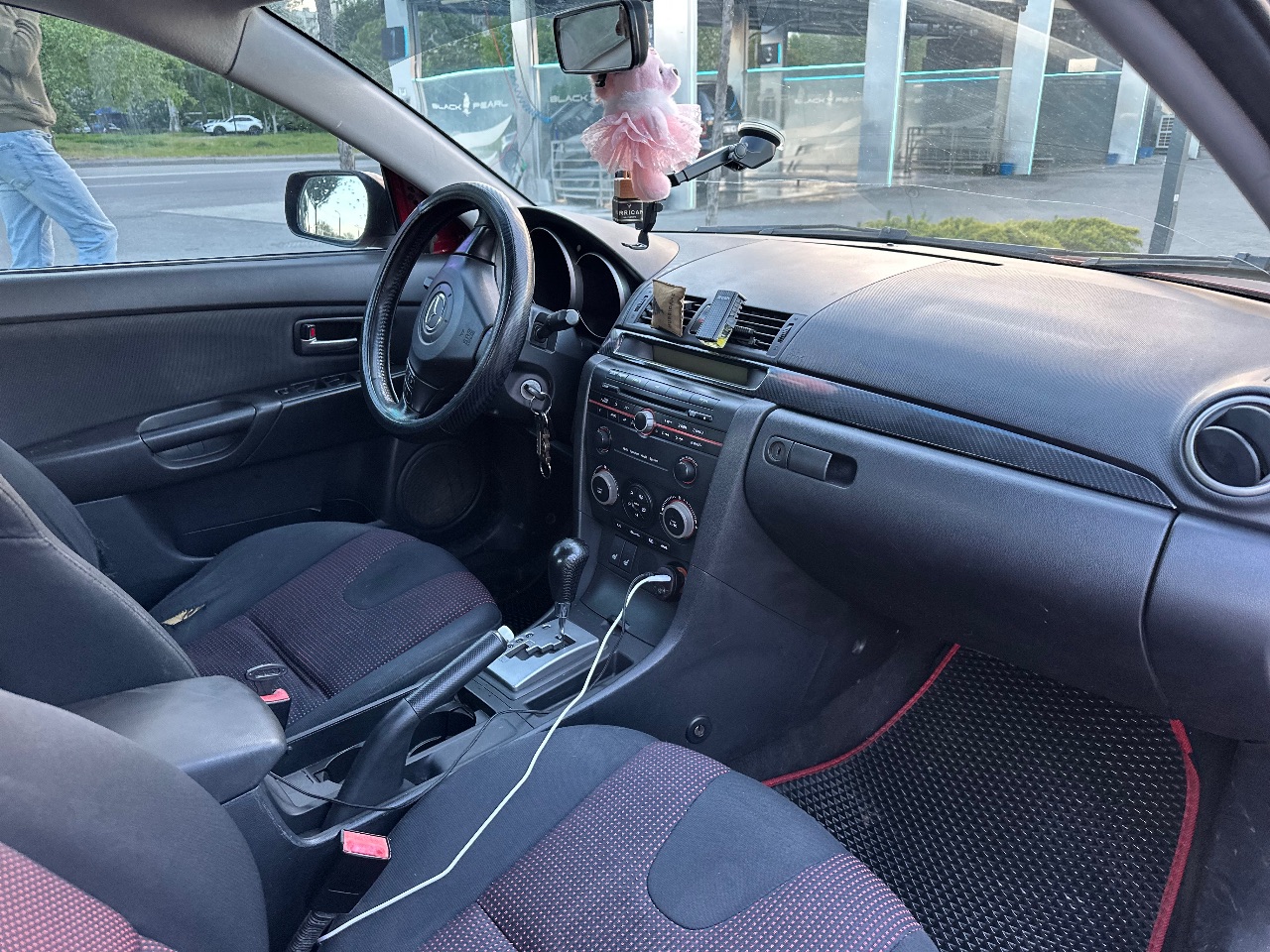 Mazda 3 - фото 7