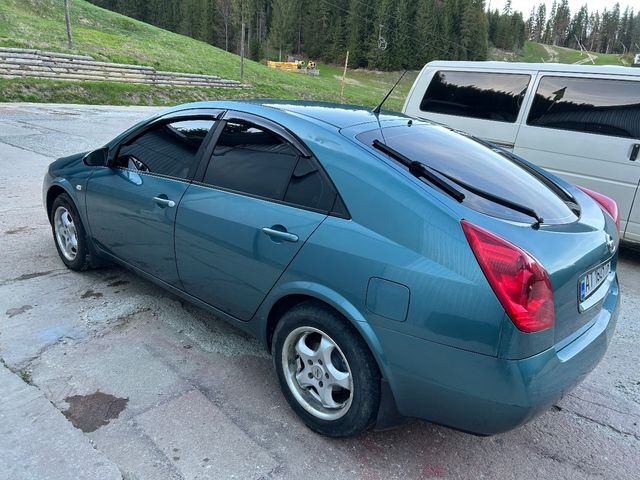 Nissan Primera - фото 5