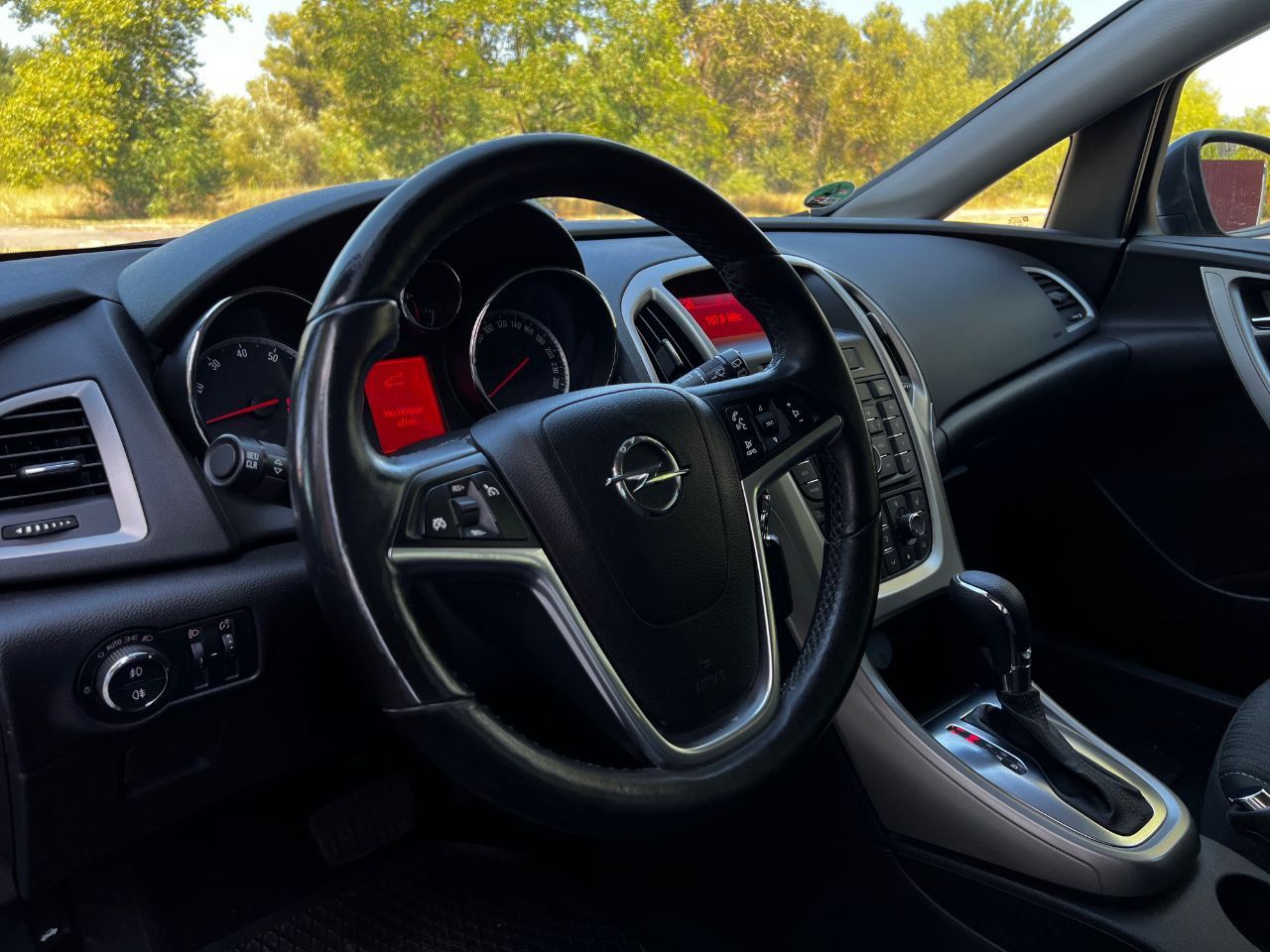 Opel Astra - фото 11