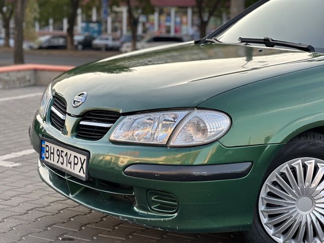 Nissan Almera - фото 2