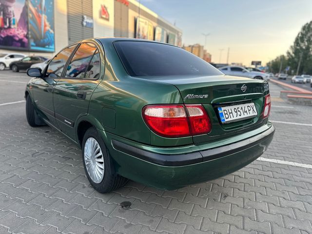Nissan Almera - фото 3
