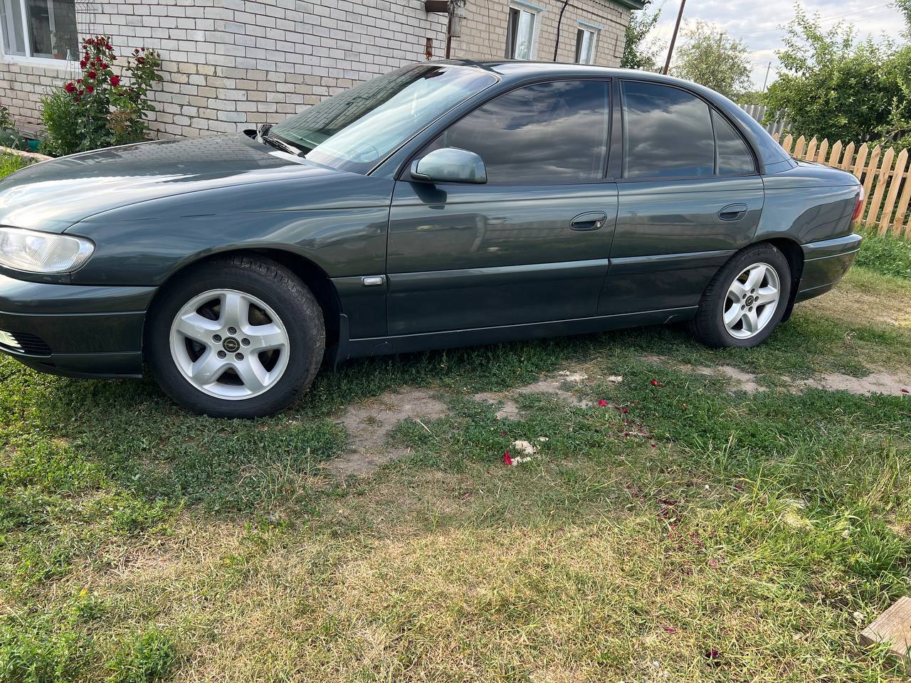 Opel Omega - фото 5
