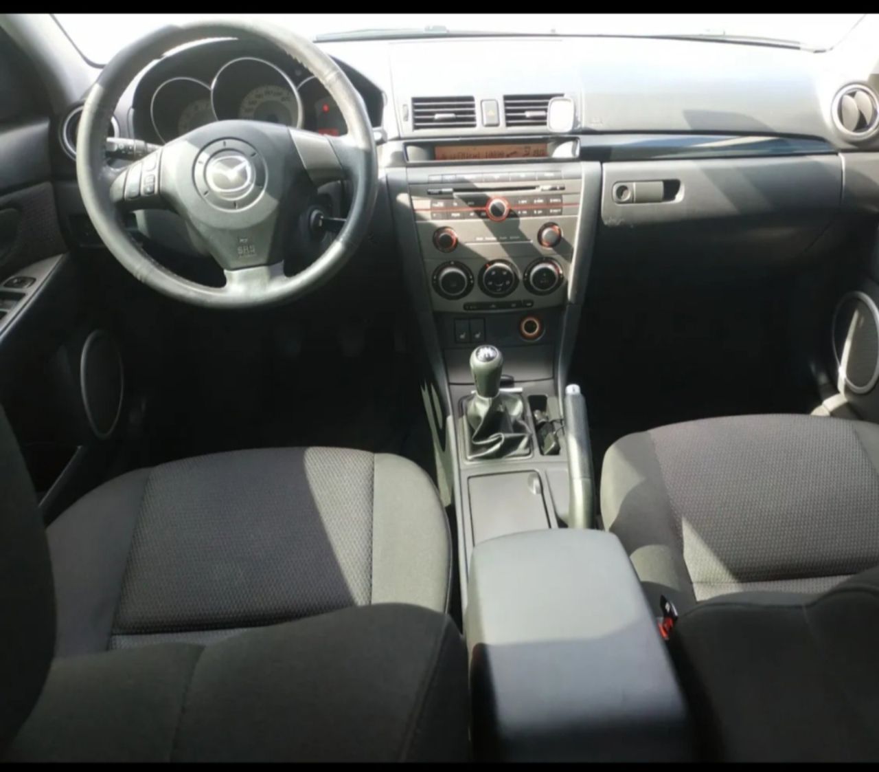 Mazda 3 - фото 7