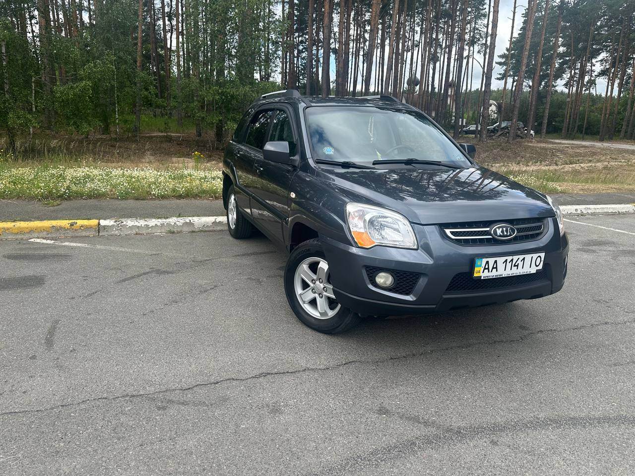 Kia Sportage - фото 1