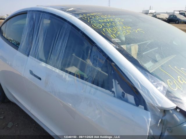 Tesla Model 3 - фото 16