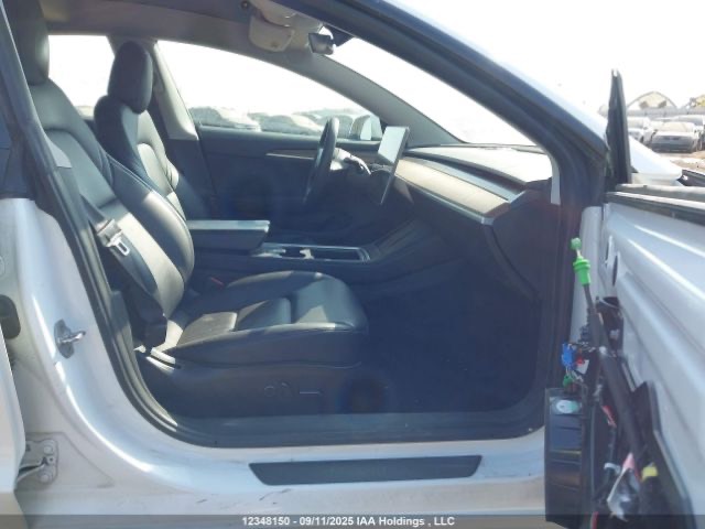 Tesla Model 3 - фото 5