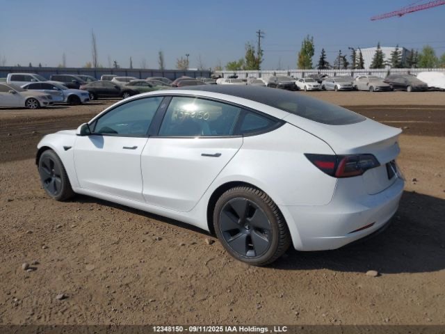 Tesla Model 3 - фото 1