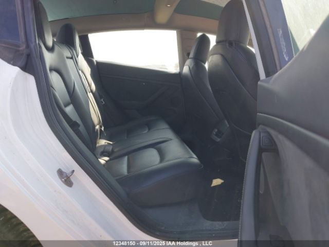 Tesla Model 3 - фото 7