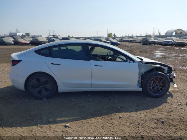 Tesla Model 3 - фото 13