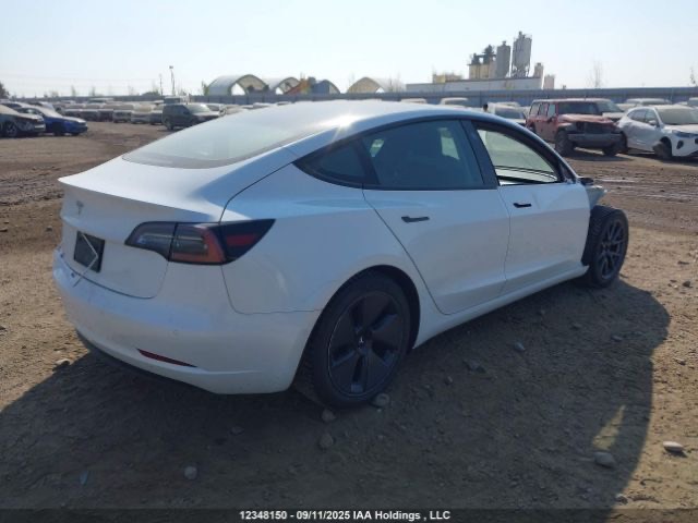 Tesla Model 3 - фото 4