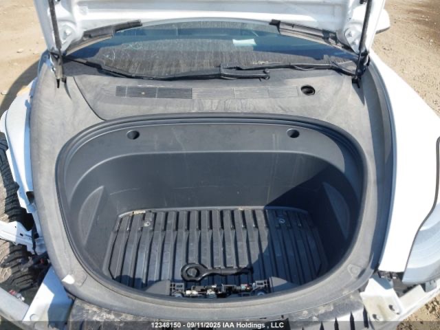 Tesla Model 3 - фото 12