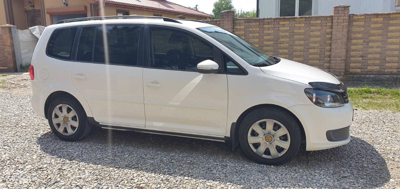 Volkswagen Touran - фото 4