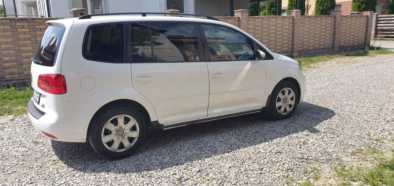 Volkswagen Touran - фото 8