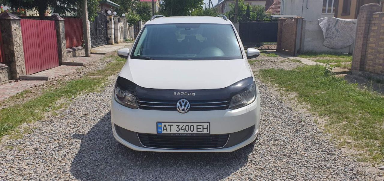 Volkswagen Touran - фото 1