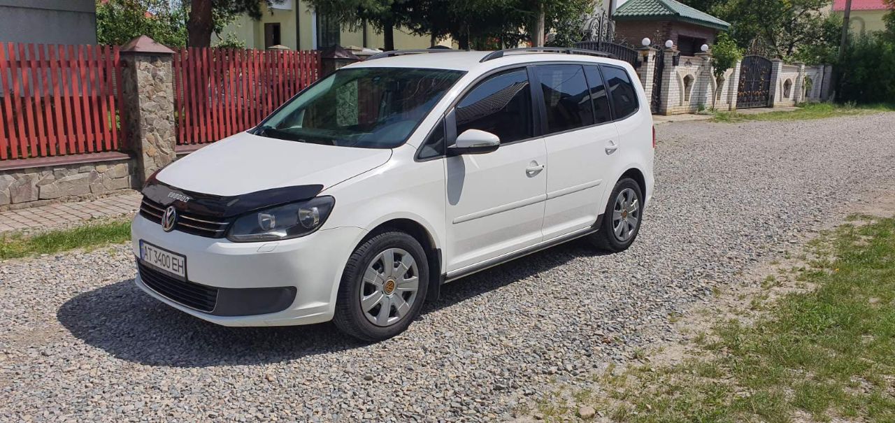 Volkswagen Touran - фото 7