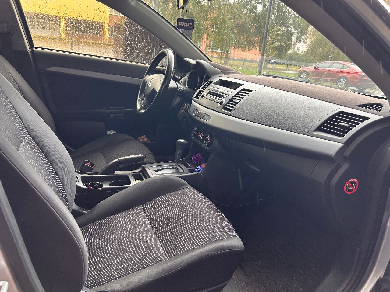 Mitsubishi Lancer - фото 7