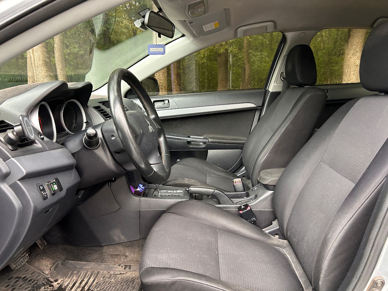 Mitsubishi Lancer - фото 9