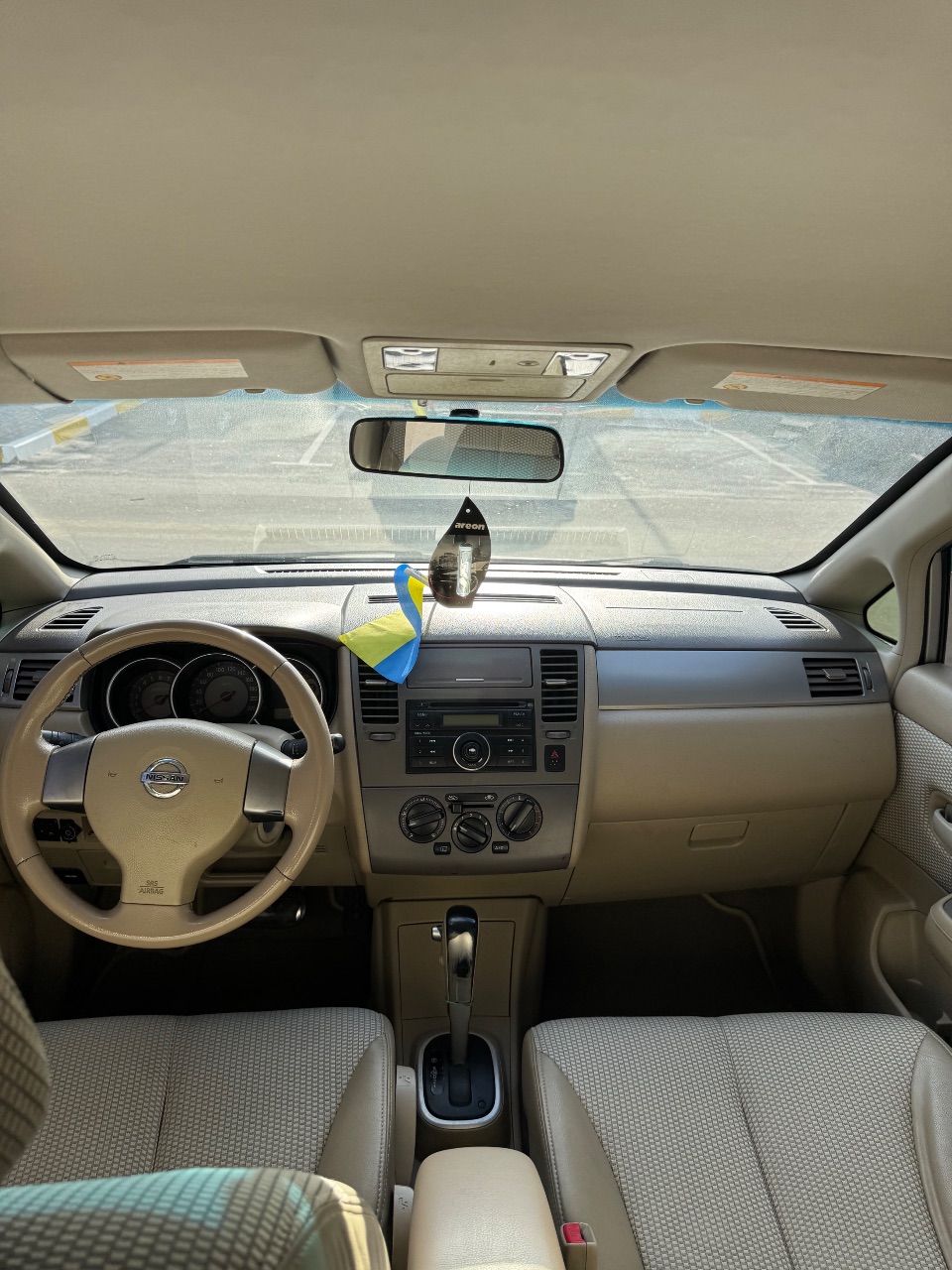 Nissan Tiida - фото 14