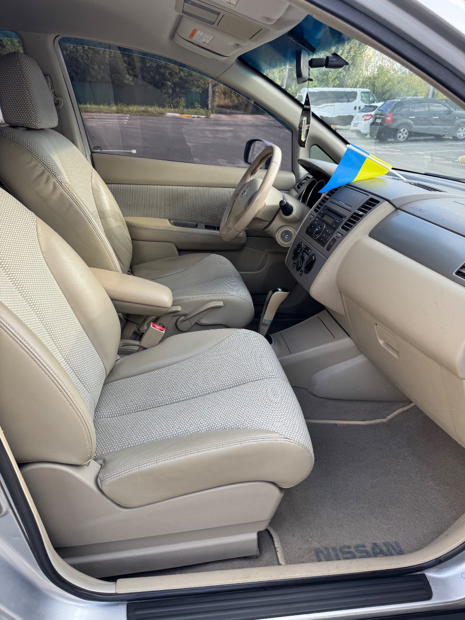 Nissan Tiida - фото 13