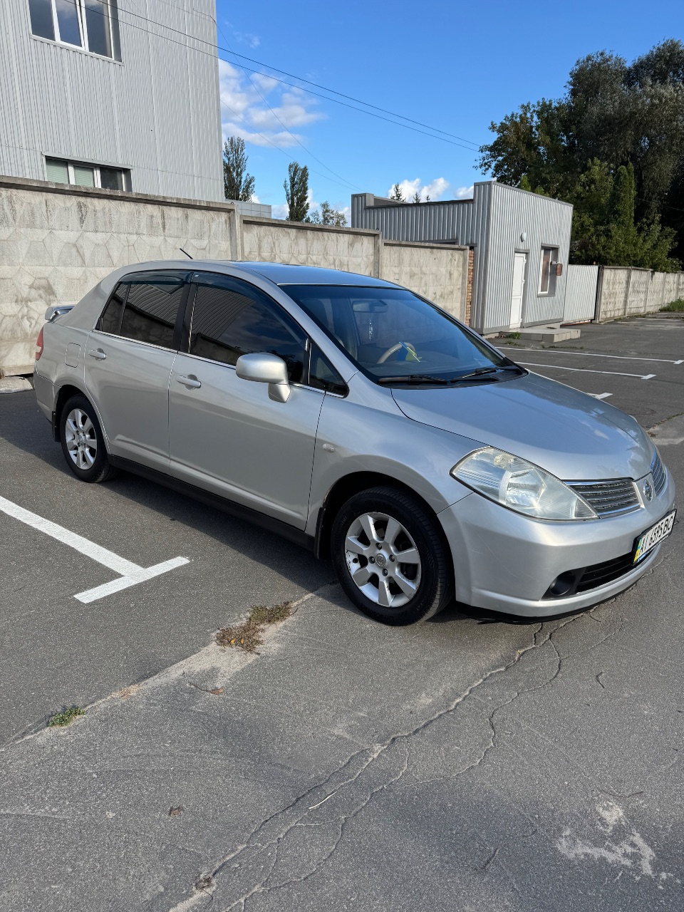 Nissan Tiida - фото 3
