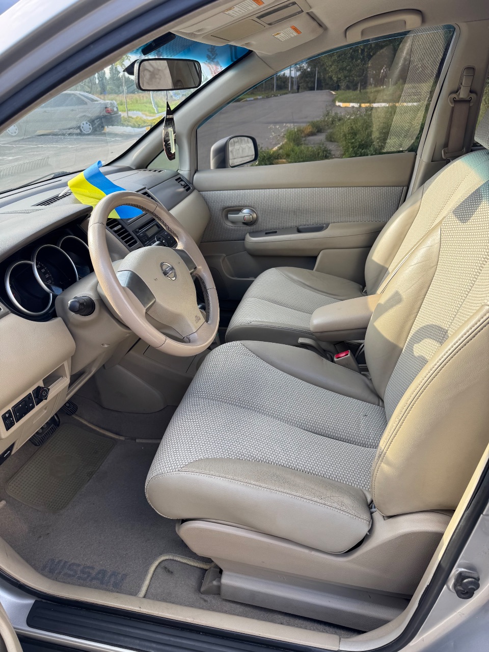 Nissan Tiida - фото 10