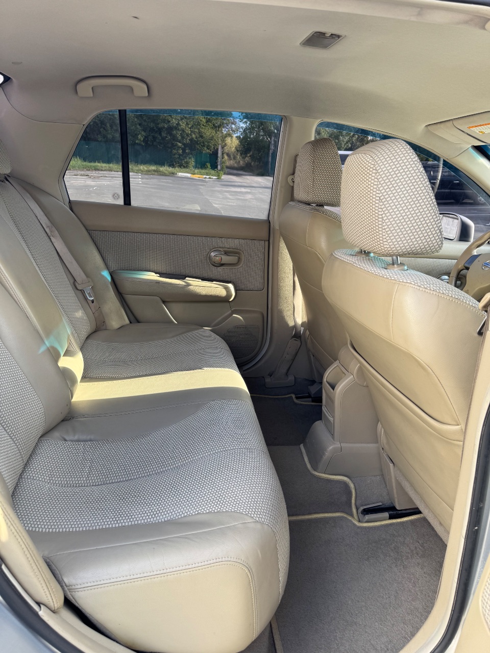 Nissan Tiida - фото 12