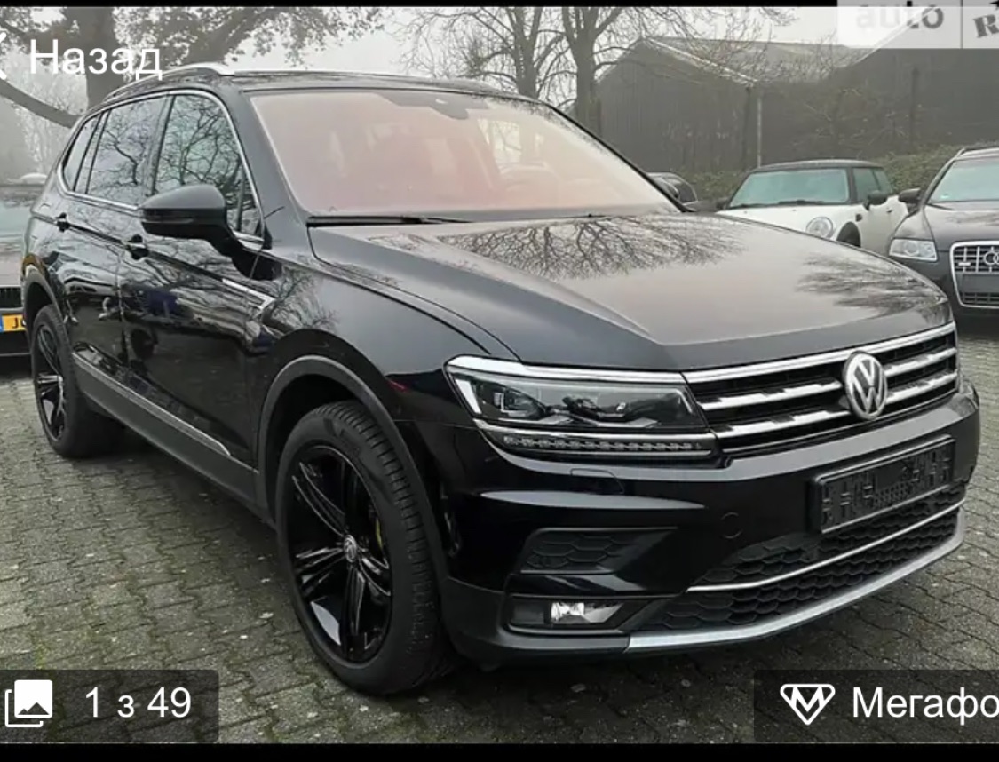 Volkswagen Tiguan - фото 1
