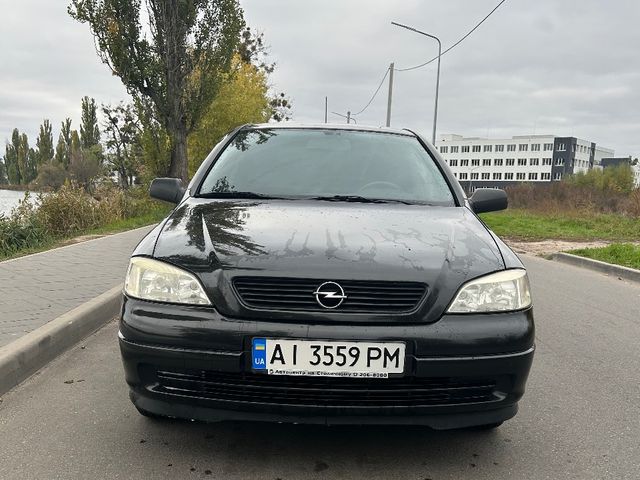 Opel Astra - фото 1