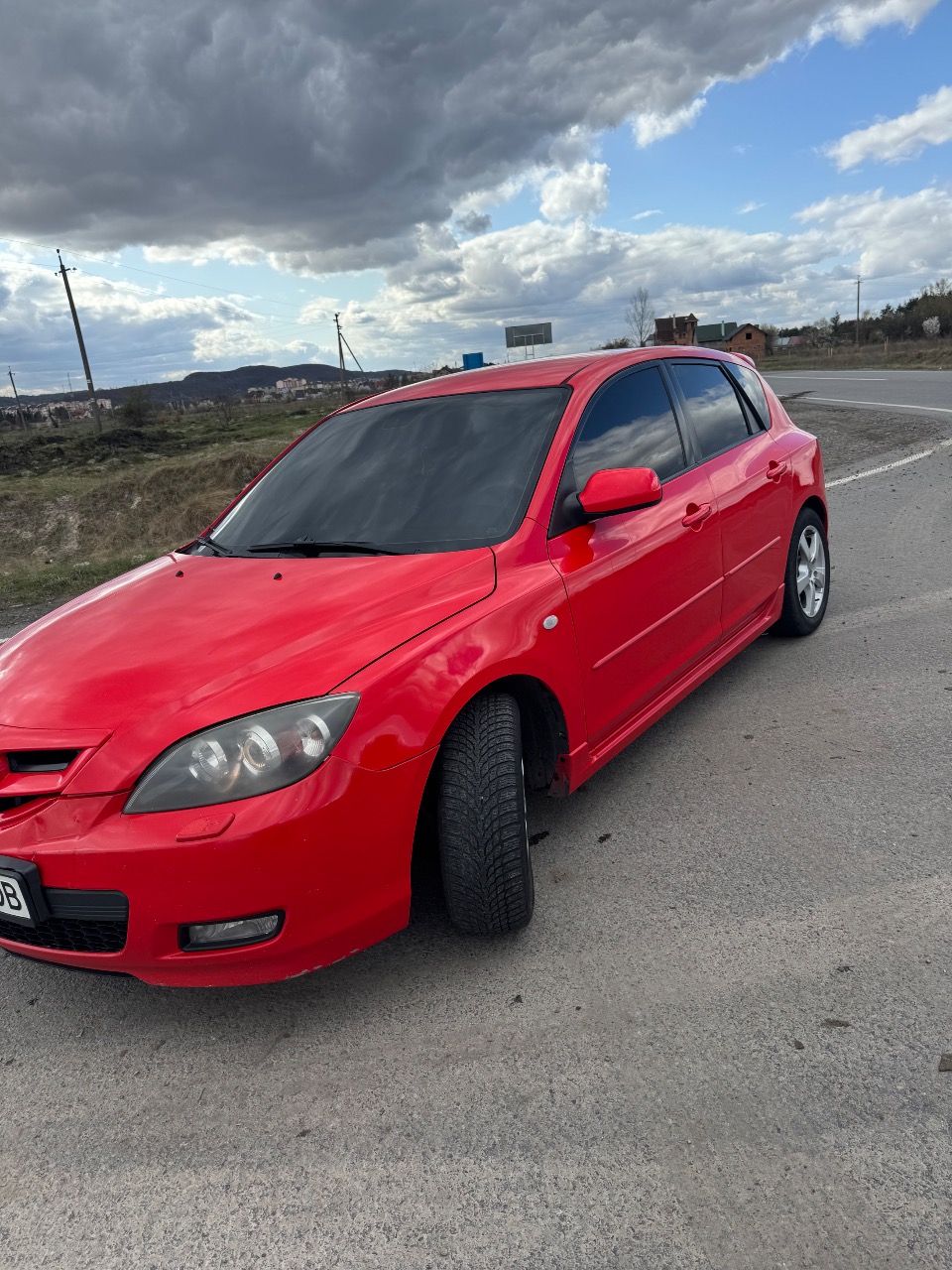 Mazda 3 - фото 1