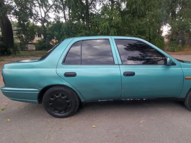 Nissan Sunny - фото 3