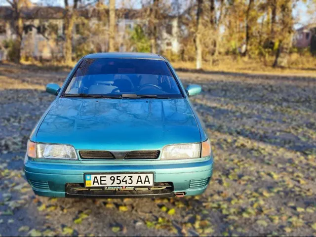 Nissan Sunny - фото 1