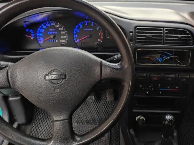 Nissan Sunny - фото 4