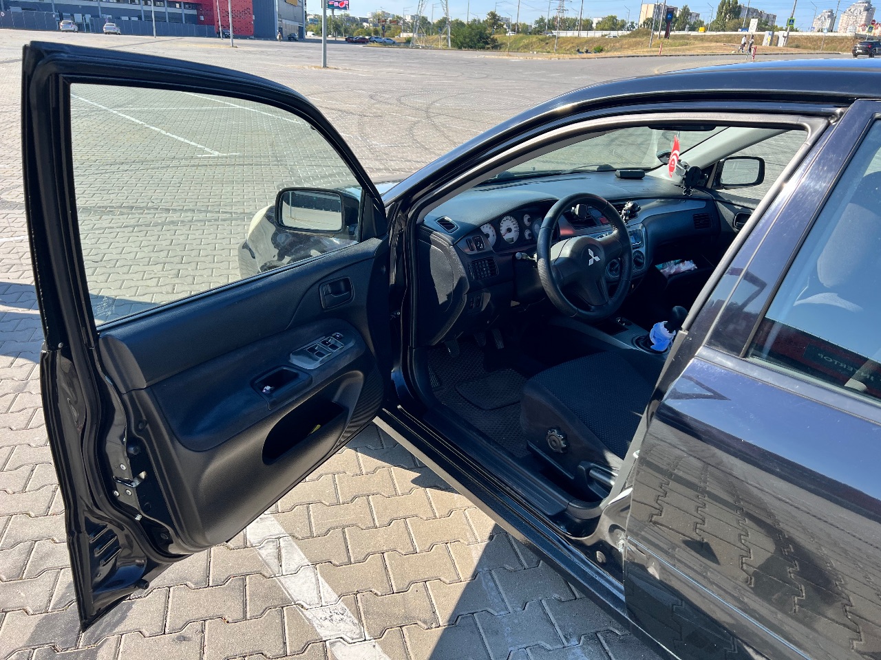 Mitsubishi Lancer - фото 10