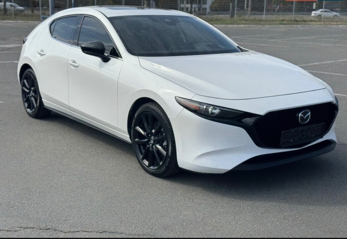 Mazda 3 - фото 6