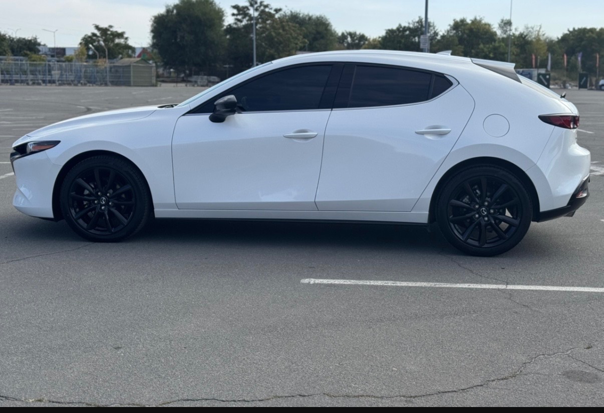 Mazda 3 - фото 11