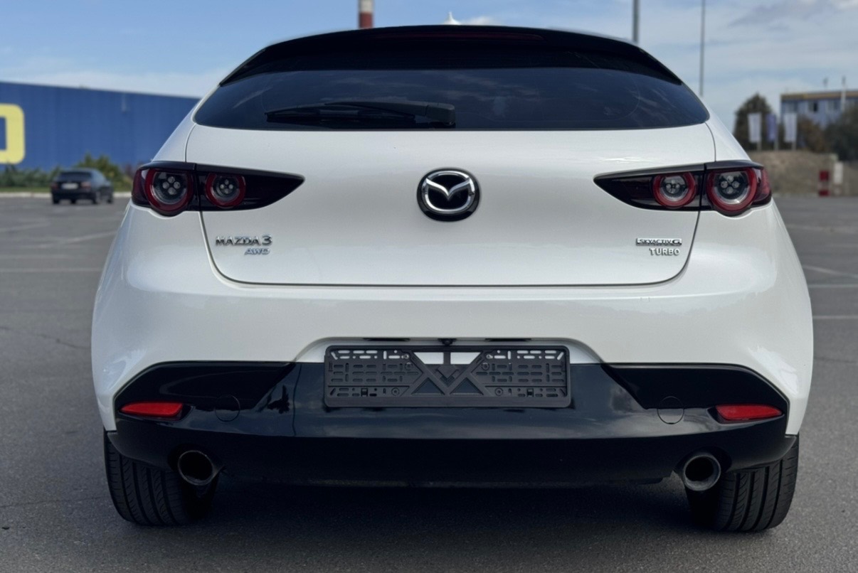 Mazda 3 - фото 7