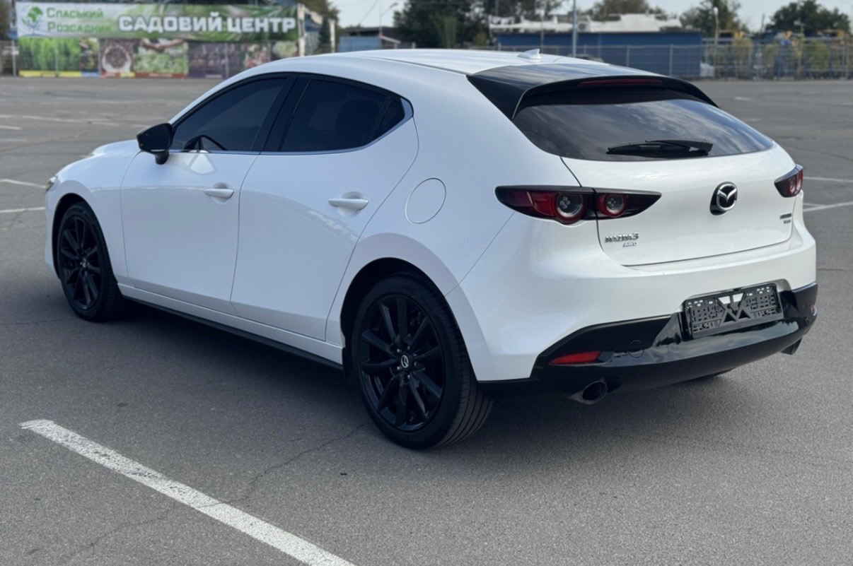 Mazda 3 - фото 10
