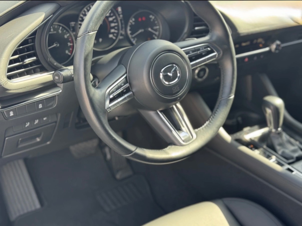 Mazda 3 - фото 14