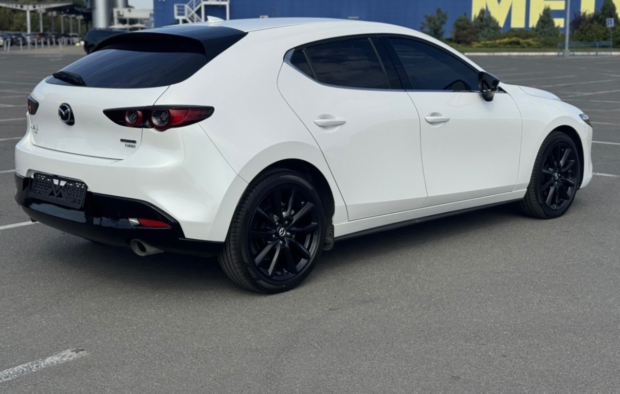 Mazda 3 - фото 8