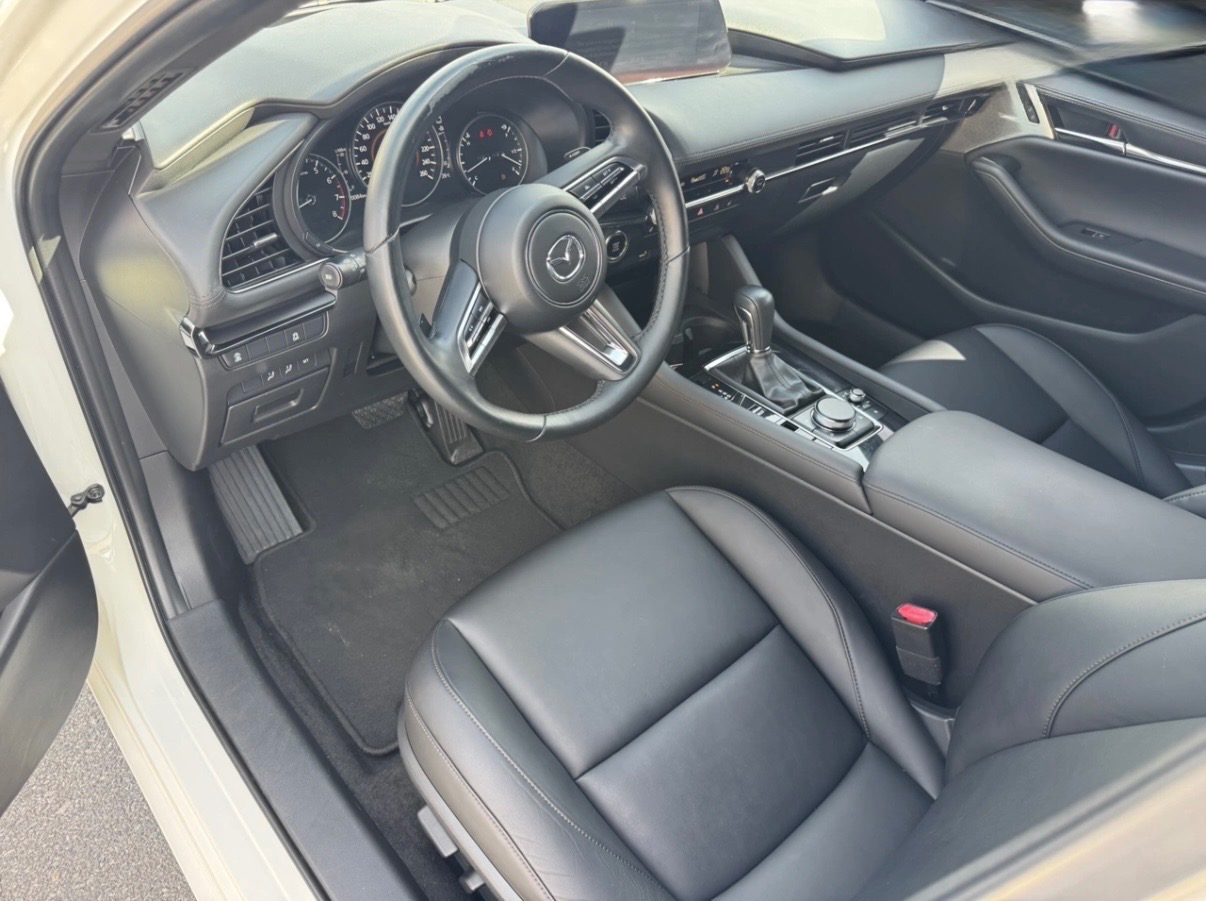 Mazda 3 - фото 12