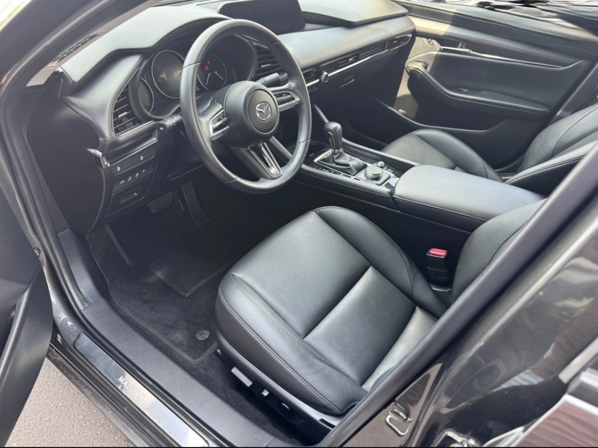 Mazda 3 - фото 12