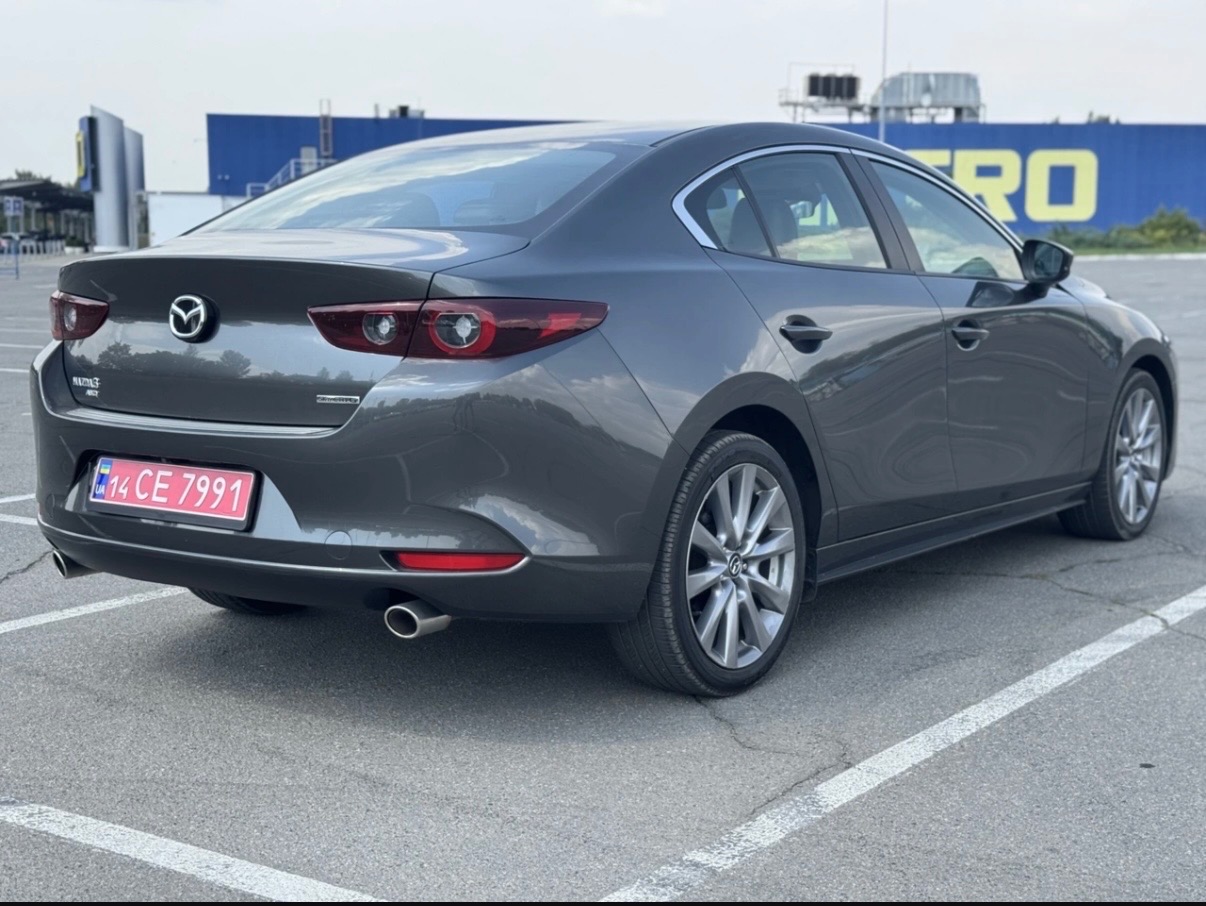 Mazda 3 - фото 6