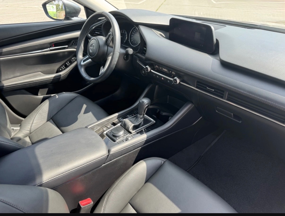 Mazda 3 - фото 13