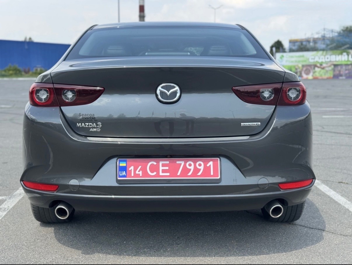 Mazda 3 - фото 7