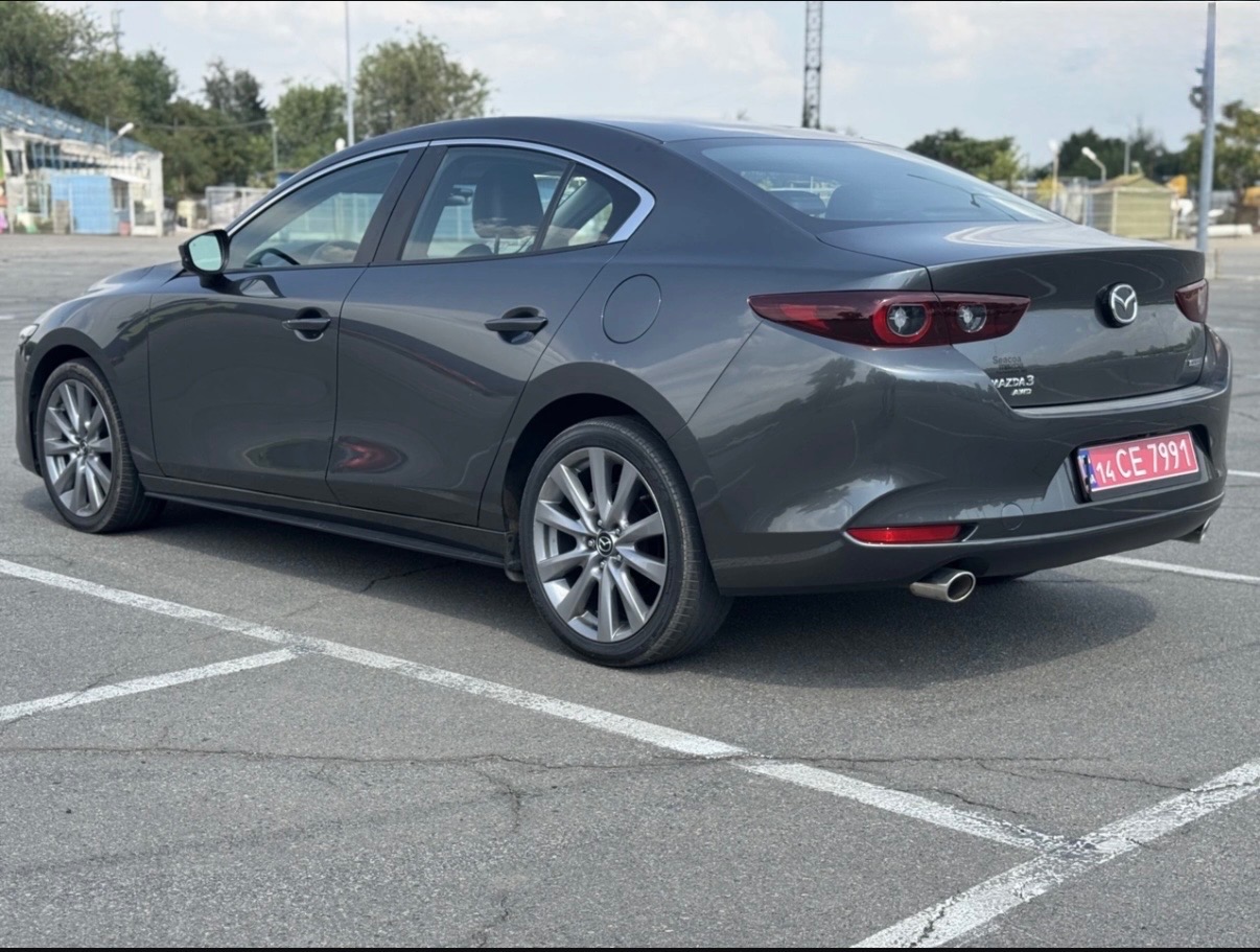 Mazda 3 - фото 8