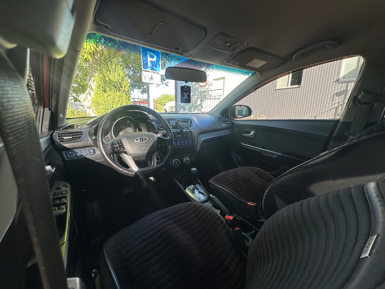 Kia Rio - фото 12