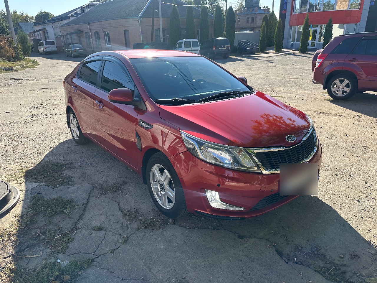Kia Rio - фото 3