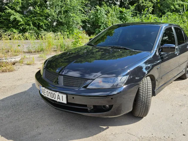 Mitsubishi Lancer - фото 2