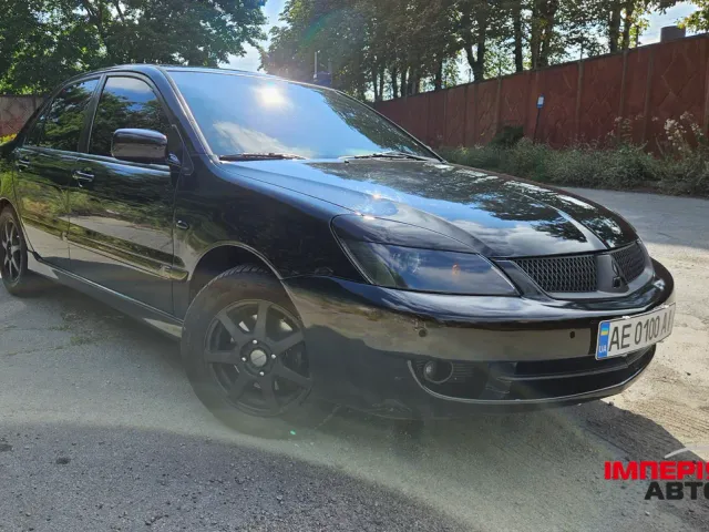 Mitsubishi Lancer - фото 1