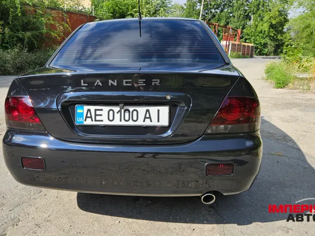 Mitsubishi Lancer - фото 4
